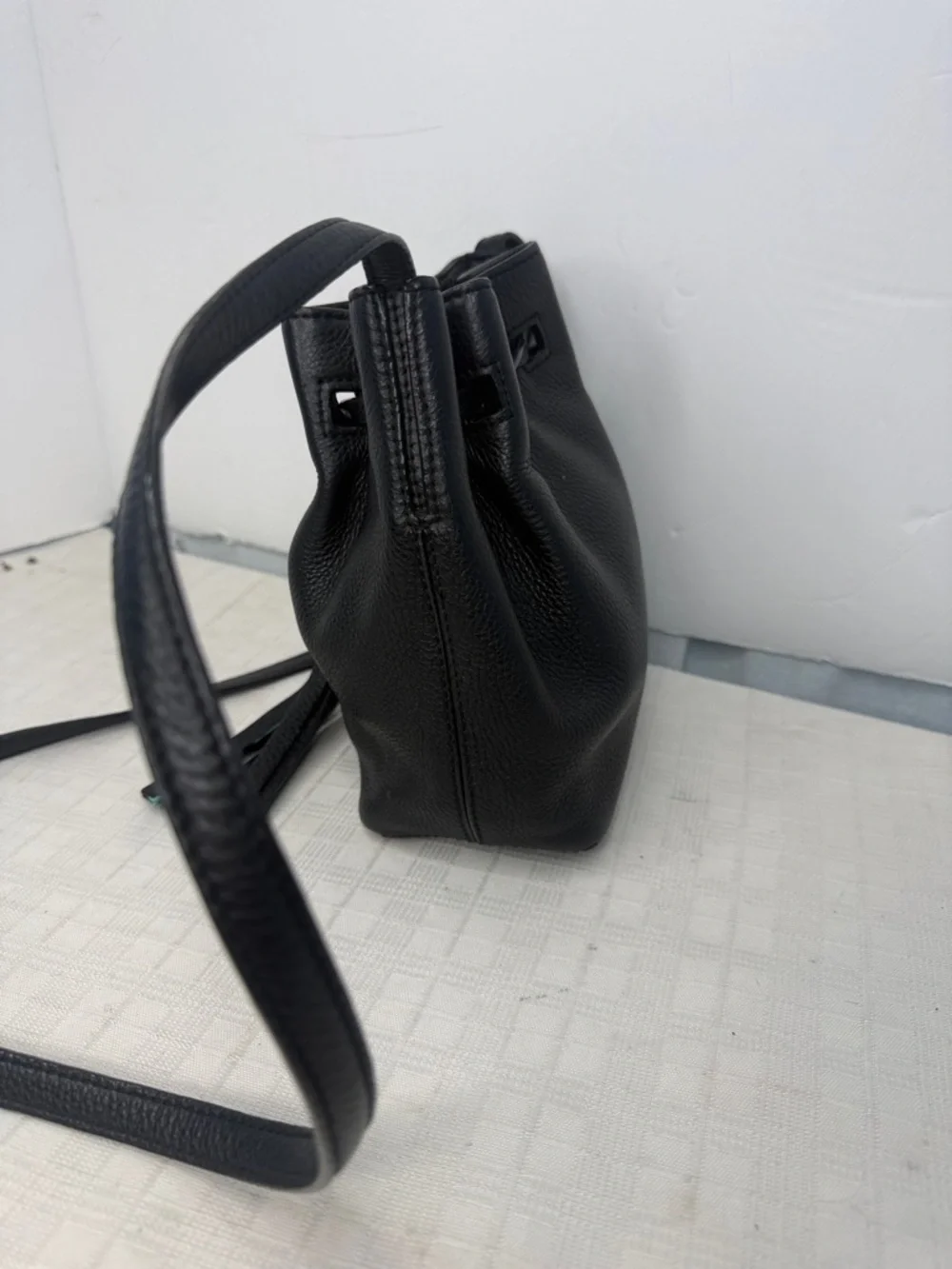 Kate Spade New York drawstring bucket bag, from the Grey Street  Tiny Cooper